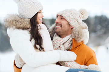 happy couple outdoors in winter