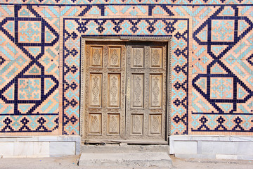 old wooden double doors with mosaic on the walls, the Central As