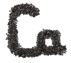 group poppy seeds in the shape of letters "Ca" (Calcium) on whit