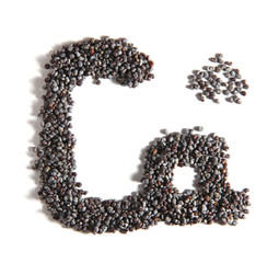 Obraz premium poppy seeds in the shape of letters 
