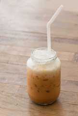 Glass Of Cold Coffee On Wood