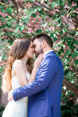 Fototapeta premium boho style wedding, vintage wedding, bride and groom, sincere feelings, a holiday for two, a wedding in retro style, fashionable toning, creative color