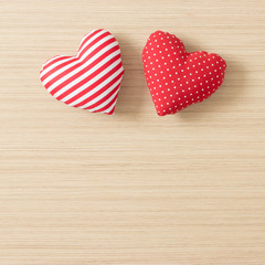 Valentine hearts on wooden background