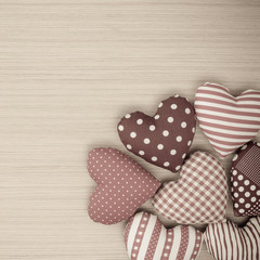 Valentine hearts on wooden background