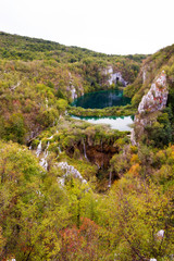 Fototapeta na wymiar Autumn view over the blue lakes in Plitvice national park, an UNESCO world heritage site, in Croatia