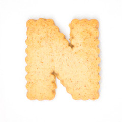 letter N made of cracker cookie isolated on white background.