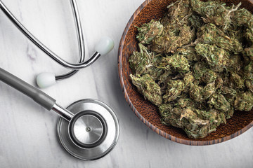 Medical Marijuana Cannabis buds bowl natural herb medication healthcare stethoscope