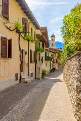 Picturesque small town street view in Limone, Lake Garda Italy.