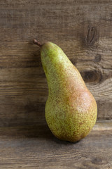 Pear on wooden background