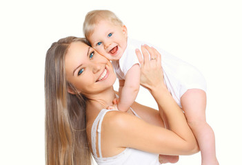 Happy smiling mother and baby having fun together on white backg