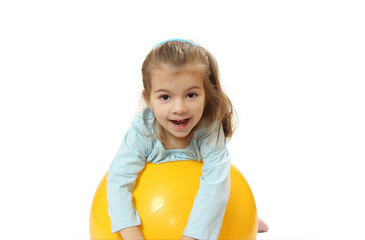 the nice little girl with a big ball