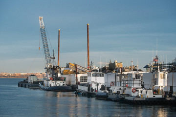 Naklejka premium Tugboat dock service at the port.
