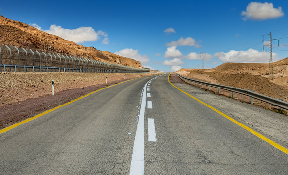 Road in desert of the Negev near a border between Egypt and Israel