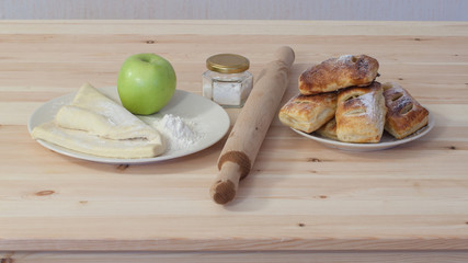 Ingredients for making strudels with apples in the oven