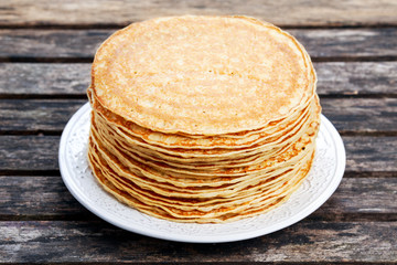 Fresh stack golden  pancakes  on plate