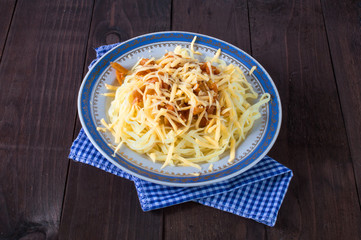 macaroni and cheese in a dish on the table