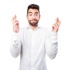 Fototapeta premium cool young man crossing his fingers