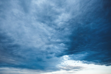 Naklejka na ściany i meble Background with Sky and Unusual Stormy Clouds