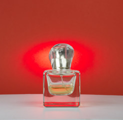 perfume on a red background