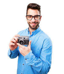 nerd man with a vintage camera