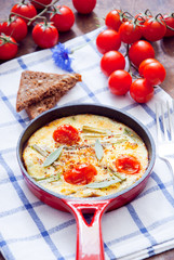 Omelette with cherry tomatoes