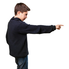 little boy pointing to the copy space