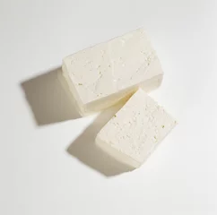Fototapeten Feta cheese on white background © Edward O'Neil