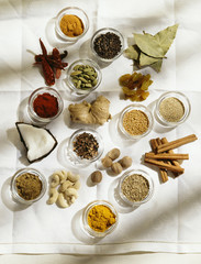 Assortment of spices. Cinnamon, cashew, raisins, bay leaf Ingredients