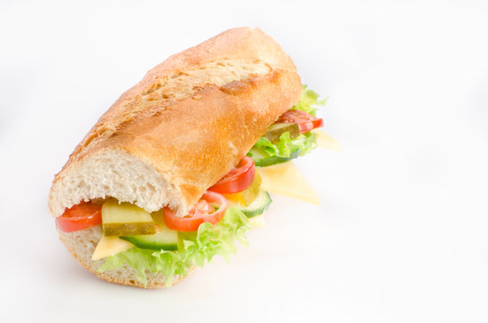 baguette with lettuce and cheese cucumber and tomatoes, sandwich