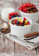 Healthy breakfast with granola and fresh berries