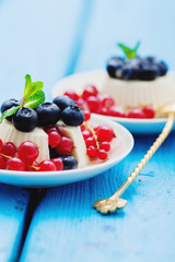 Healthy breakfast with granola and fresh berries