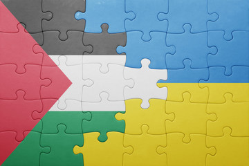 Fototapeta premium puzzle with the national flag of ukraine and palestine
