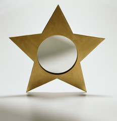 Gold star shaped mirror
