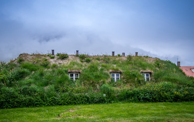 Fototapeta na wymiar Traditional turf houses in Iceland - 3