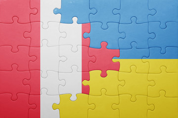 puzzle with the national flag of ukraine and peru