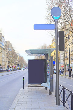 Paris, France, February 6, 2016: Bus  stop on the street of Paris, France