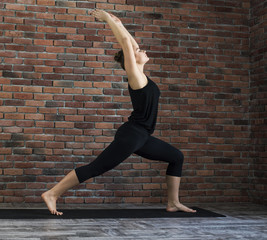 Fototapeta na wymiar woman practicing yoga 