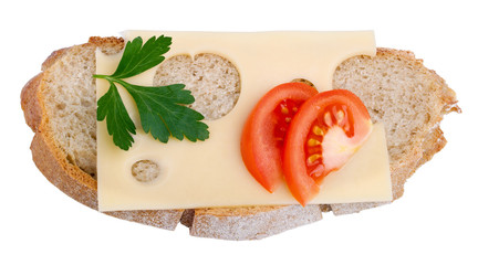 Rye bread, cheese and tomato isolated on a white background