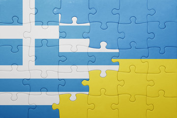 Fototapeta premium puzzle with the national flag of ukraine and greece