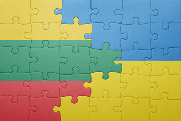puzzle with the national flag of ukraine and lithuania