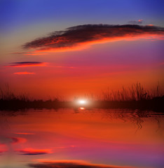 Fototapeta na wymiar Nice sunset over lake