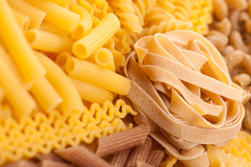 Assortment of italian pasta, five different varieties separated