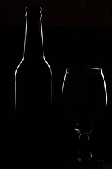 Contour of beer bottle and glass