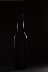 Contour of dark beer bottle