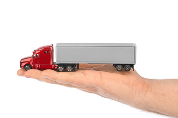 Toy car truck in hand