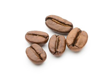Coffee beans isolated on white background, closeup, macro