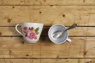 Cup top view on wooden table background