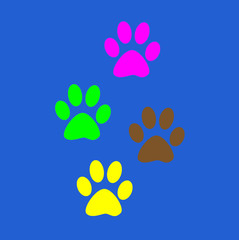 Background of colorful fun Prints paw prints animal. Color paw dog, the imprint of paws of a pet. Print on a blue background. 