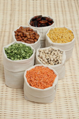 Set of various pulses in linen pouches