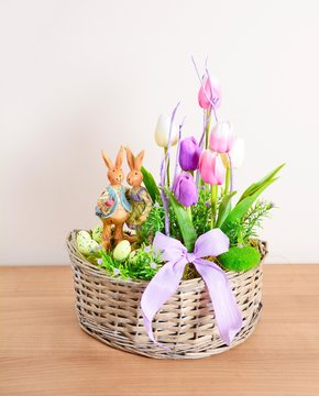 Easter floral home decoration on the table. Homemade arrangement.